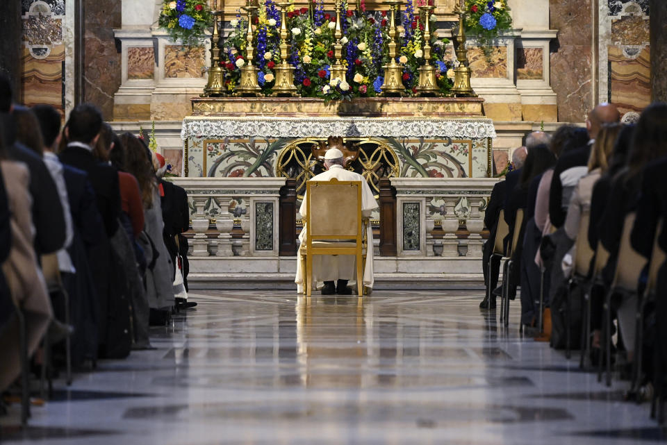 Pope Francis prays in the Gregorian Chapel in St. Peter's Basilica at the Vatican, Saturday, May 1, 2021. Pope Francis led a special prayer service Saturday evening to invoke the end of the pandemic. (Riccardo Antimiani/Pool photo via AP)
