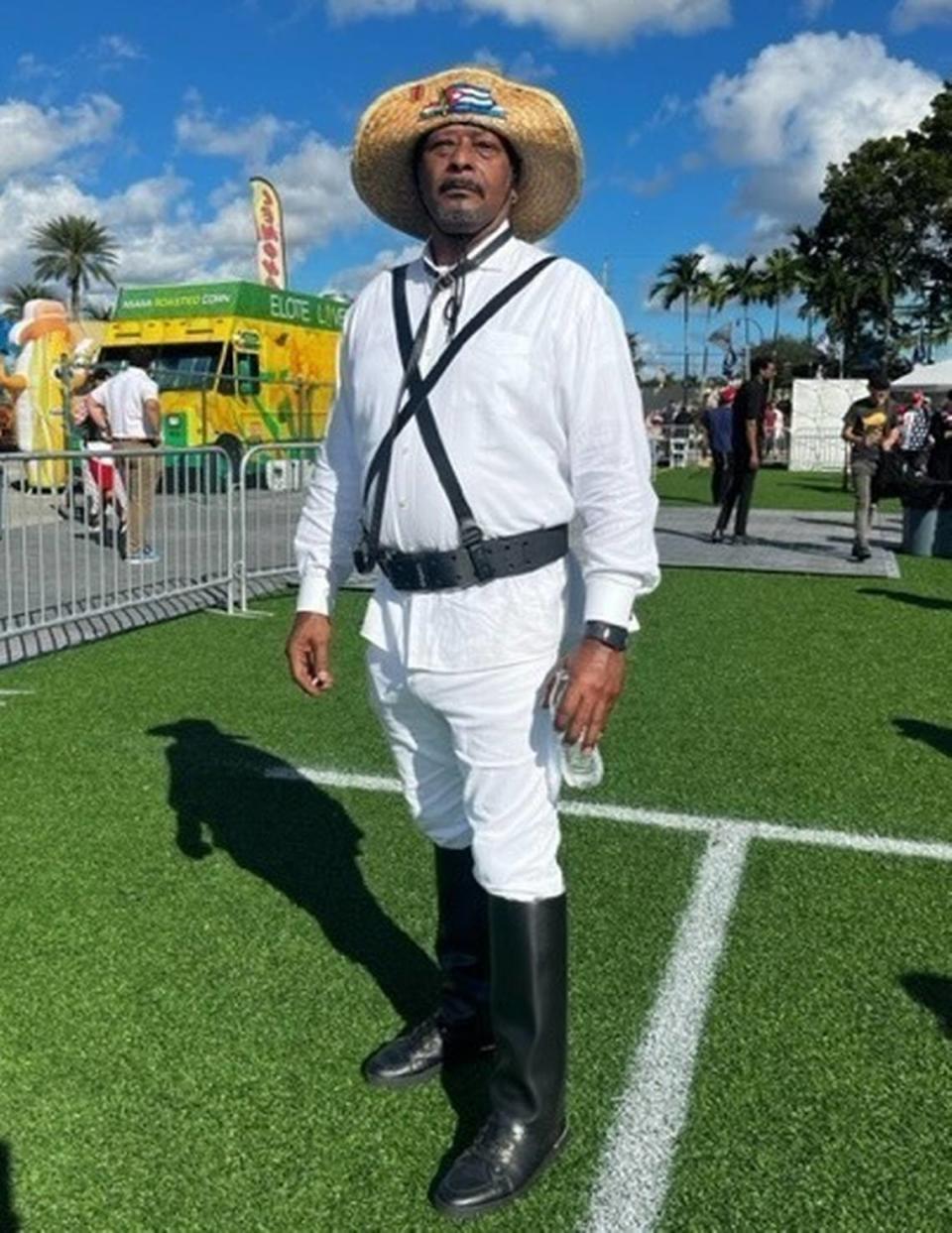 Santiago Torran Barnet, 61, attends Trump’s Hialeah rally dressed in all white like a mambí, or a Cuban fighter who gained independence from Spain in the late 1800s, on Wednesday, November 8, 2023.