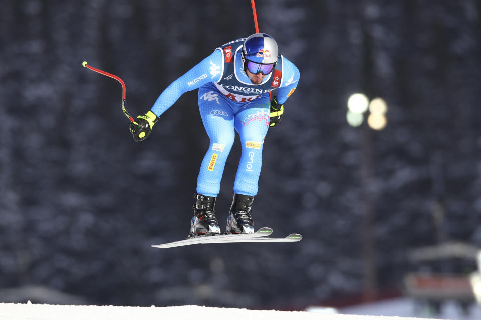 Italy's Dominik Paris speeds down the course during the downhill portion of the men's combined, at the alpine ski World Championships in Are, Sweden, Monday, Feb.11, 2019. (AP Photo/Marco Trovati)