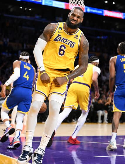 Los Angeles, California May 12, 2023-Lakers LeBron James celebrates his basket against the Warriors.