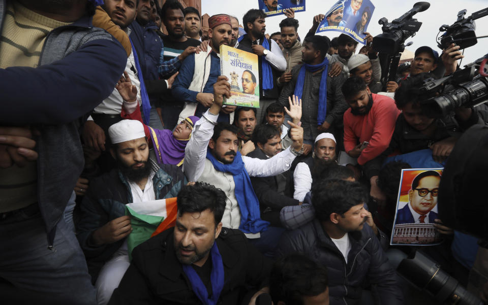 Chandrashekhar Azad, leader of the Bhim Army, a political party of Dalits who represent the Hinduism's lowest caste, center, leads a protest against a new Citizenship law, after Friday prayers in New Delhi, India, Friday, Jan. 17, 2020. Protests against India's citizenship law that excludes Muslim immigrants continue in Indian cities in an unabating strong show of dissent against the Hindu nationalist government of Prime Minister Narendra Modi. Azad was arrested on Dec. 21 after leading a similar protest at the steps of the 17th century Jama Masjid mosque, accused of instigating violence as the protest had ended in a clash between the protesters and the police. He was ordered released from prison on Thursday by a New Delhi court. (AP Photo/Manish Swarup)