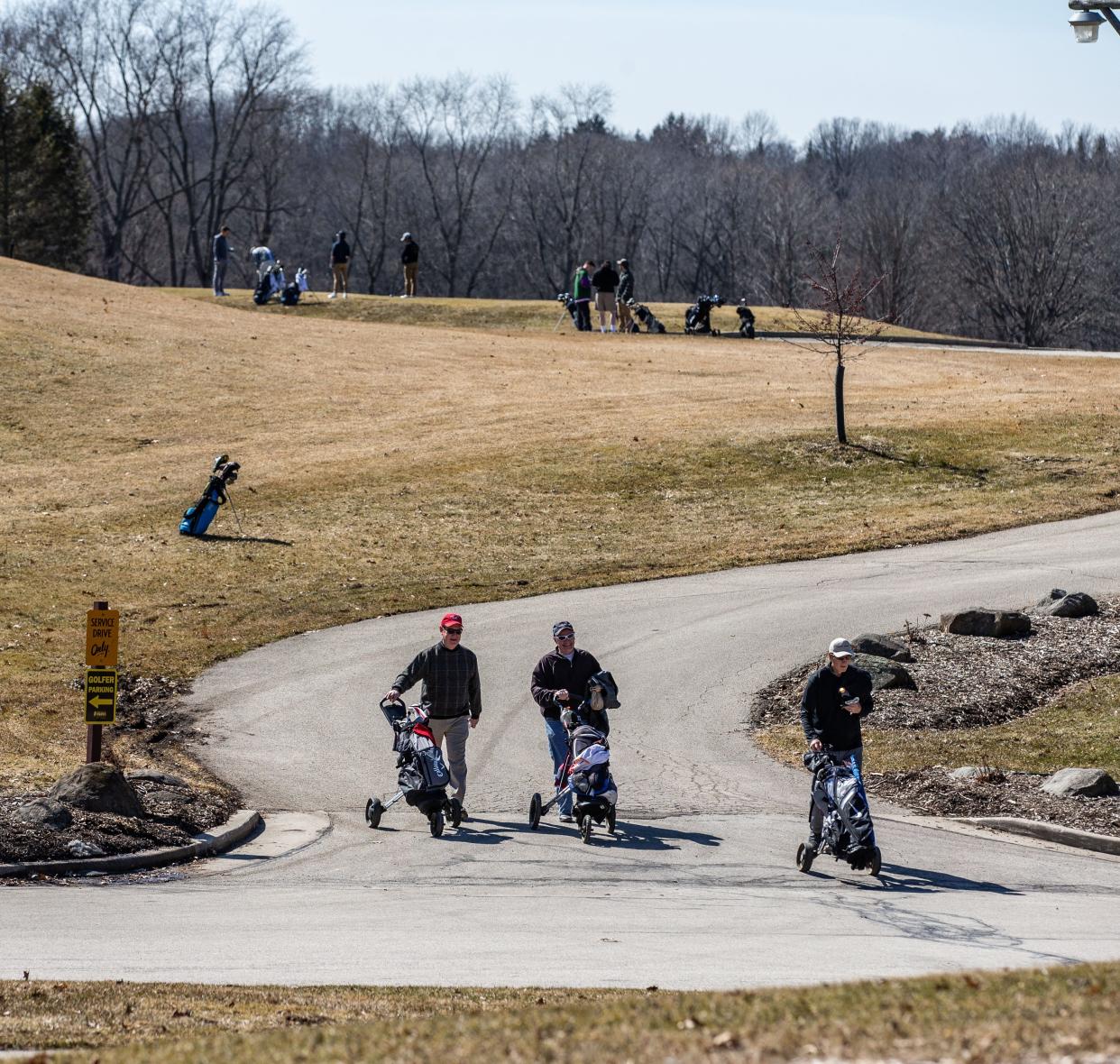 Whitnall Park Golf Course in Franklin bustles with activity on Saturday, March 23, 2019. Warm sunny weather lured many enthusiasts outside to enjoy the game.