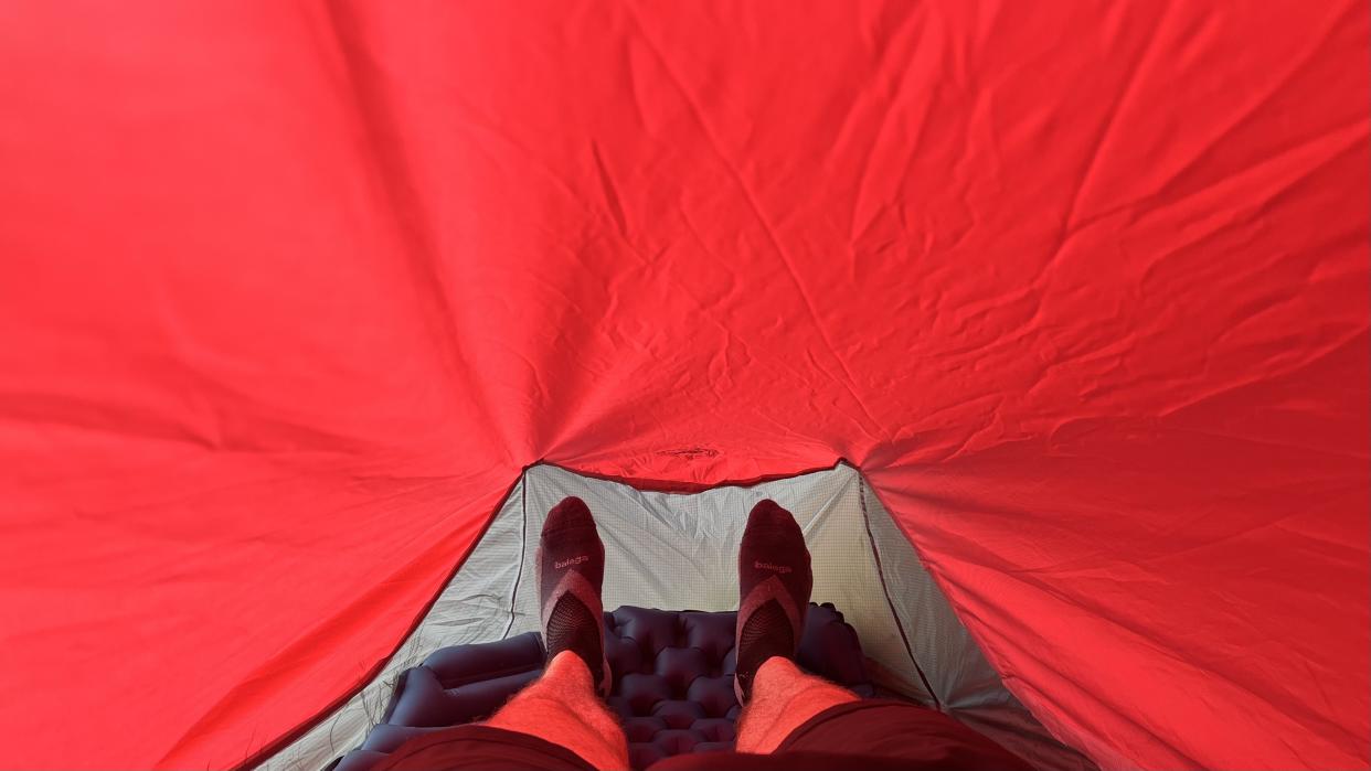  The interior of a red bivy shelter. 