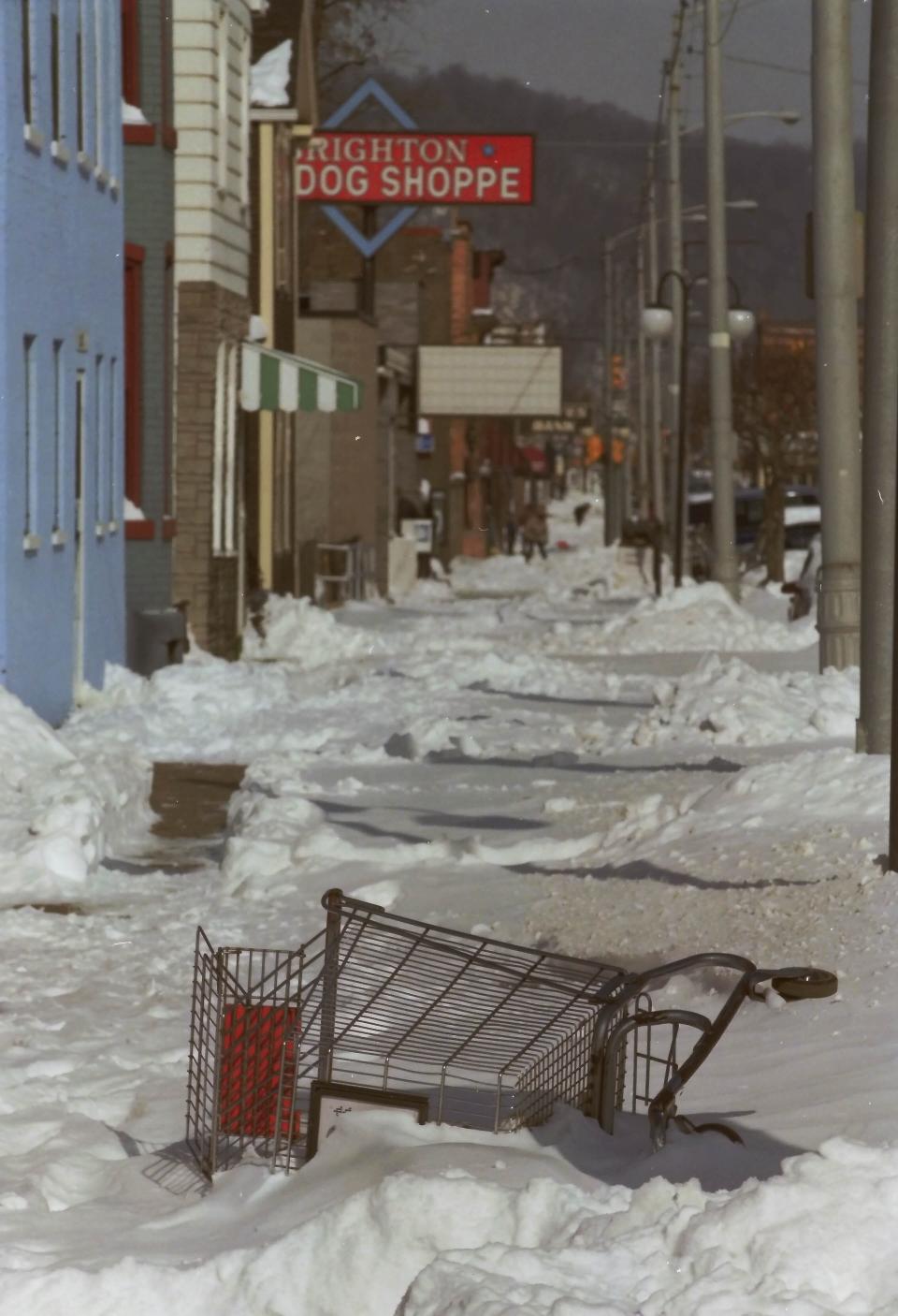 A shopping cart was abandoned in a snow bank during the Blizzard of 1993.