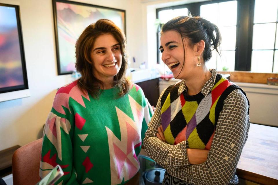 Kate Cosentino, right, and her mother, Lea Cosentino, laugh while discussing Kate’s childhood. Kate is competing on NBC’s “The Voice,” where she nicknamed her colorful clothing “clown couture.” Her mom gets style ideas from her.