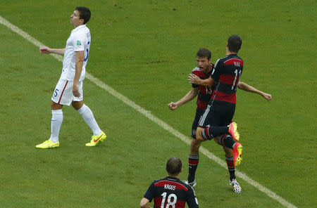 Germany's Thomas Mueller celebrates after scoring. REUTERS/Ruben Sprich