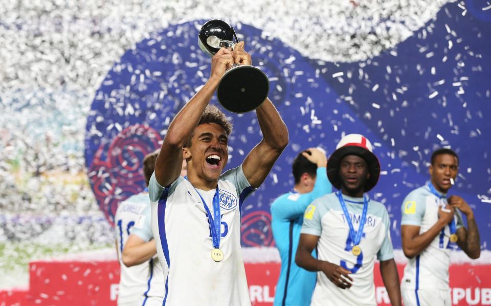 Dominic Calvert-Lewin lifts the FIFA U-20 World Cup trophy in 2017. - GETTY IMAGES