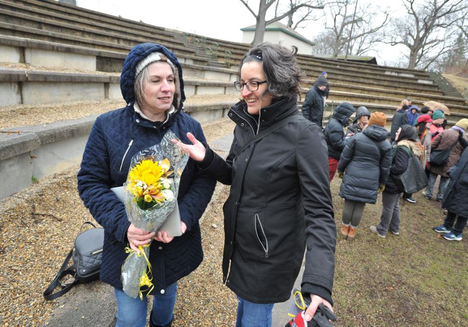 Sara Trainor Callard, of Quincy, left, daughter of the late T. Owen Trainor, the architect who designed the Ruth Gordon Amphitheater, chats with Maria Mulligan, of Quincy, right, during the Save the Ruth Gordon Amphitheater rally Saturday, March 11, 2023.