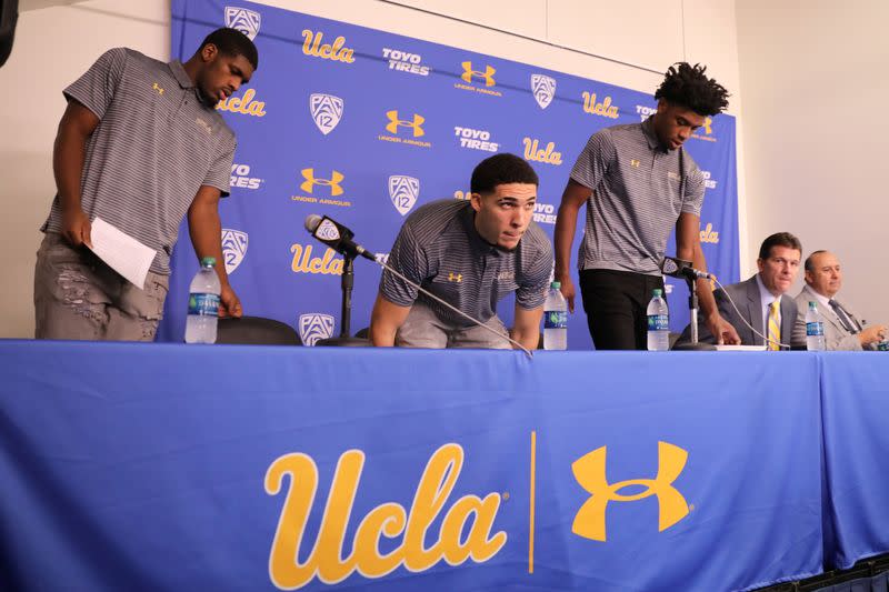 FILE PHOTO: UCLA basketball players Cody Riley, LiAngelo Ball, and Jalen Hill arrive to speak at a press conference at UCLA after flying back from China where they were detained on suspicion of shoplifting, in Los Angeles