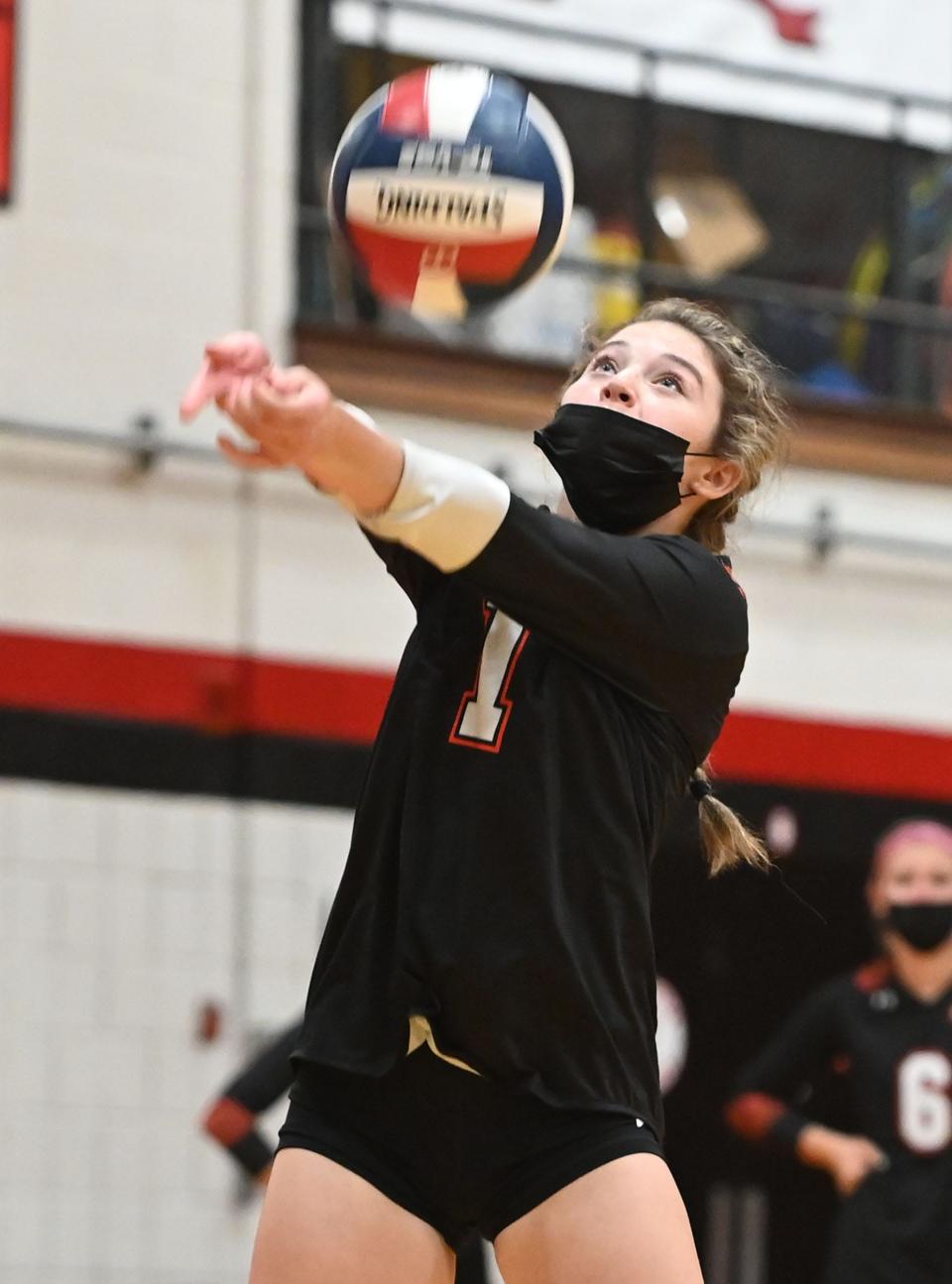 Oliver Ames Rachel Fleischman sets the ball  during a game versus Brockton on Wednesday, Oct. 6, 2021.