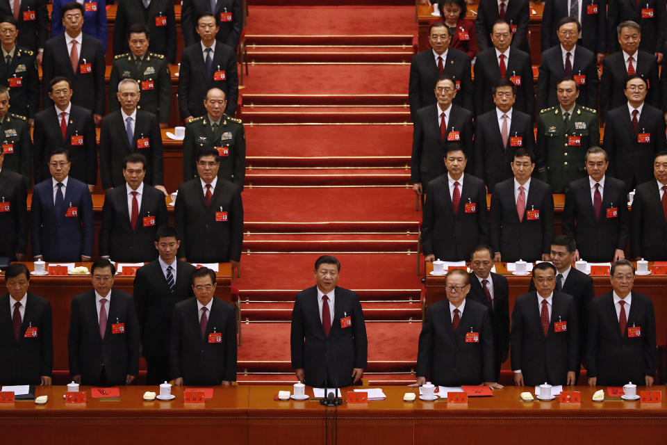 FILE - Chinese President Xi Jinping, front row center, and his cadres sing the Communist song during the closing ceremony for the 19th Party Congress held at the Great Hall of the People in Beijing on Oct. 24, 2017. The just-concluded 2022 Winter Olympics weren’t China's big event of the year, internally, at least. For the Communist Party, that comes this fall at a major meeting that will likely cement Xi Jinping's position as one of the nation's most powerful leaders in its seven decades of Communist rule. (AP Photo/Andy Wong, File)