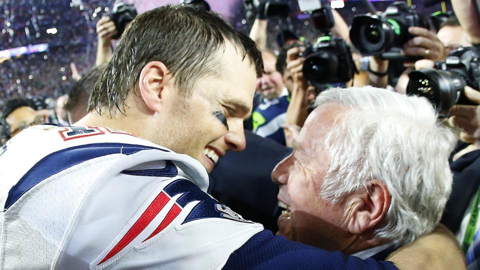 Tom Brady #12 of the New England Patriots celebrates with team owner Robert Kraft at University of Phoenix Stadium after winning Super Bowl XLIX on Feb. 1, 2015 in Glendale, Arizona.