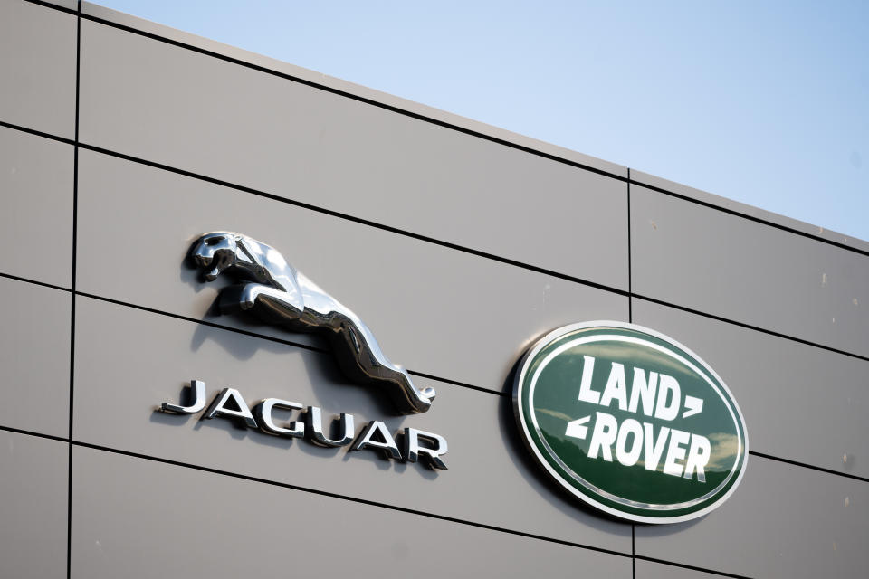 CARDIFF, WALES - JULY 22: A close-up of a Jaguar Land Rover sign at a car garage on July 22, 2020 in Cardiff, Wales. Many UK businesses are announcing job losses due to the effects of the coronavirus pandemic and lockdown. (Photo by Matthew Horwood/Getty Images)