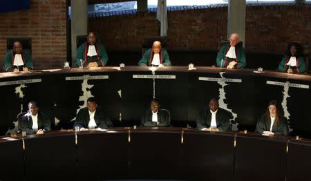 South Africa's Chief Justice Mogoeng Mogoeng (Top, C) looks on with other judges before making a ruling at the Constitutional Court in Johannesburg, South Africa ,June 22,2017. REUTERS/Siphiwe Sibeko