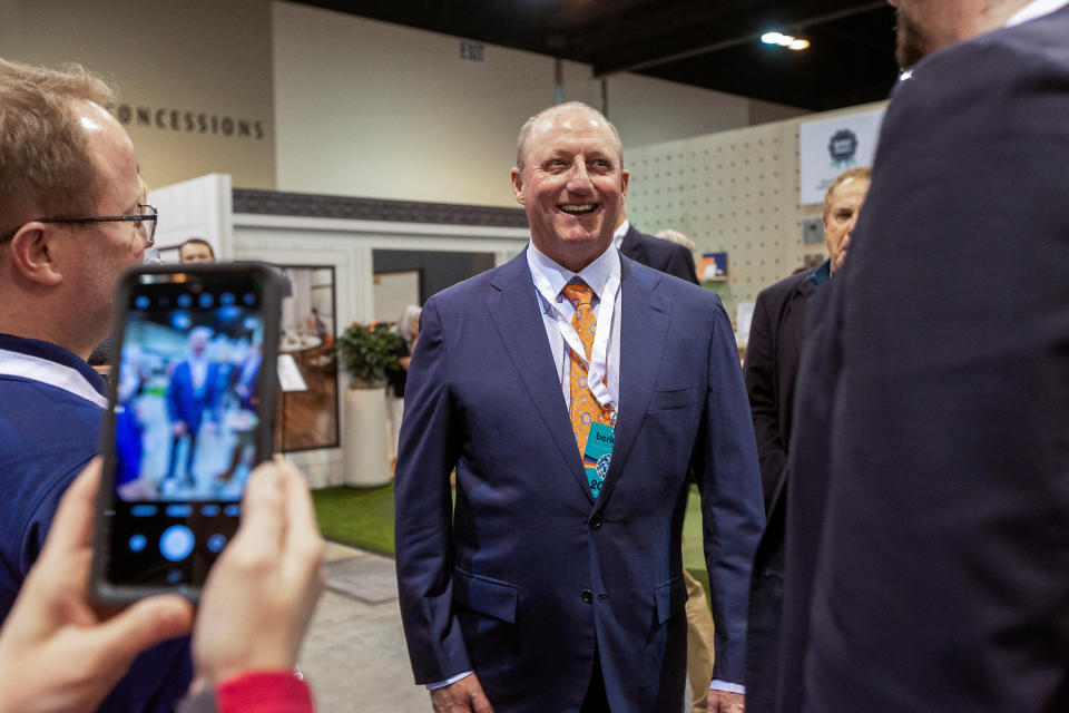 Gregory Abel, chairman and CEO of Berkshire Hathaway Energy and vice-chairman of non-insurance operations of Berkshire Hathaway, prepares to take a picture with shareholders at the company's annual meeting in Omaha, Nebraska, U.S. May 5, 2023. REUTERS/Rachel Mummey