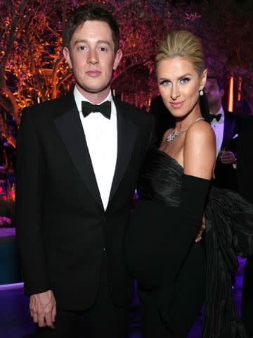 <p>Kevin Mazur/VF22/WireImage </p> James Rothschild and Nicky Hilton Rothschild attend the 2022 Vanity Fair Oscar Party on March 27, 2022 in Beverly Hills, California.