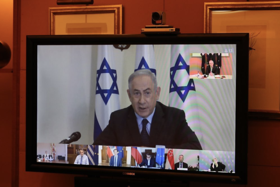 Pictured is Israeli Prime Minister Benjamin Netanyahu addresses the club via a virtual discussion. 