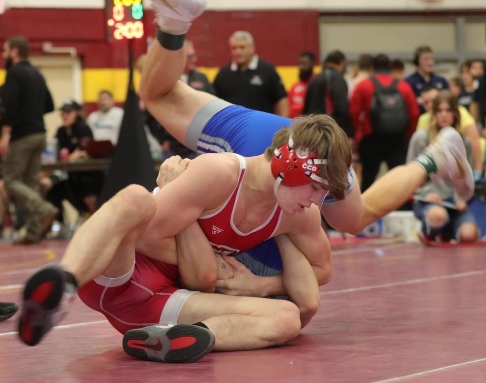 Wadsworth's Chris Earnest pins Reynolds' Camren Klenke during the Ironman Wrestling Tournament in 150 pounds on Friday, Dec. 10, 2021 in Cuyahoga Falls, Ohio, at Walsh Jesuit High School.