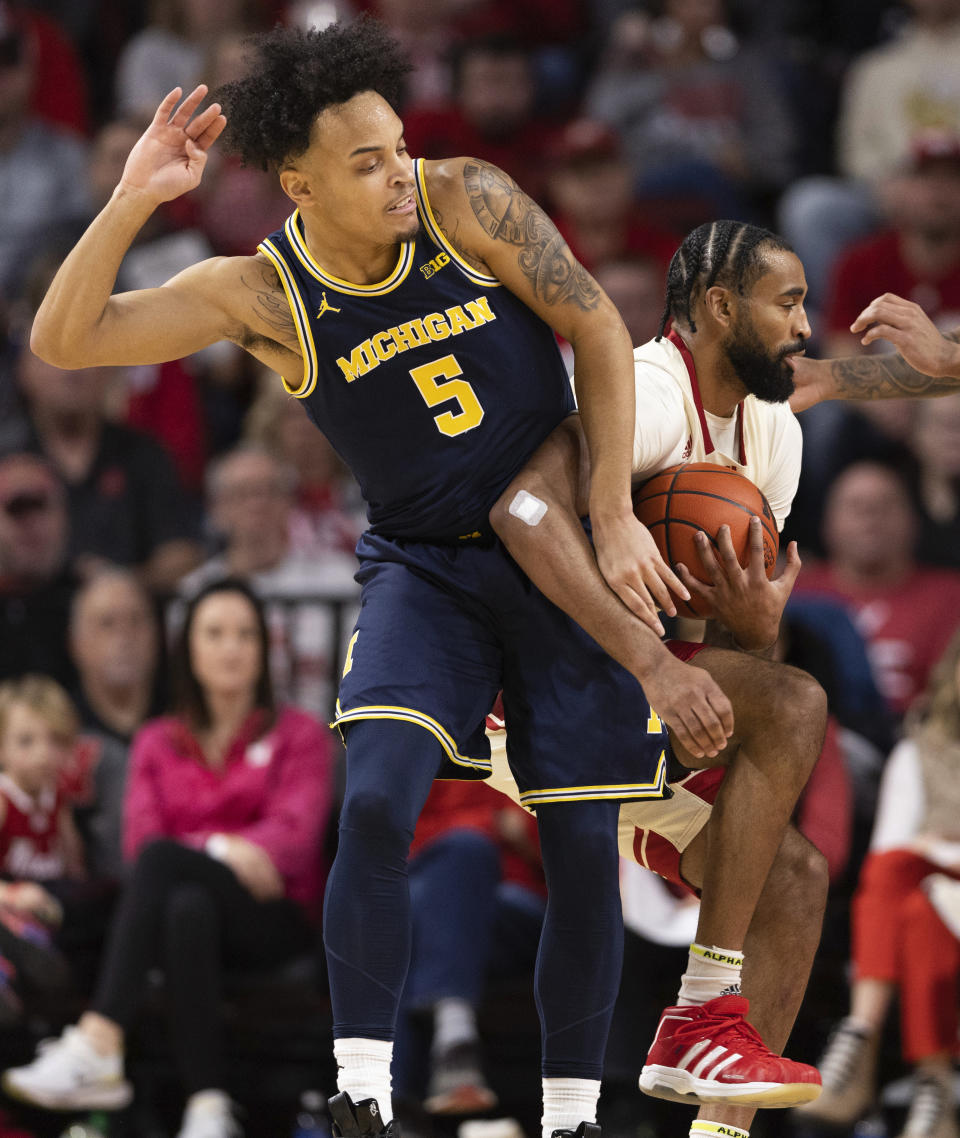 Nebraska's Brice Williams, right, steals the ball from Michigan's Terrance Williams II during the first half of an NCAA college basketball game, Saturday, Feb. 10, 2024, in Lincoln, Neb. (AP Photo/Rebecca S. Gratz)