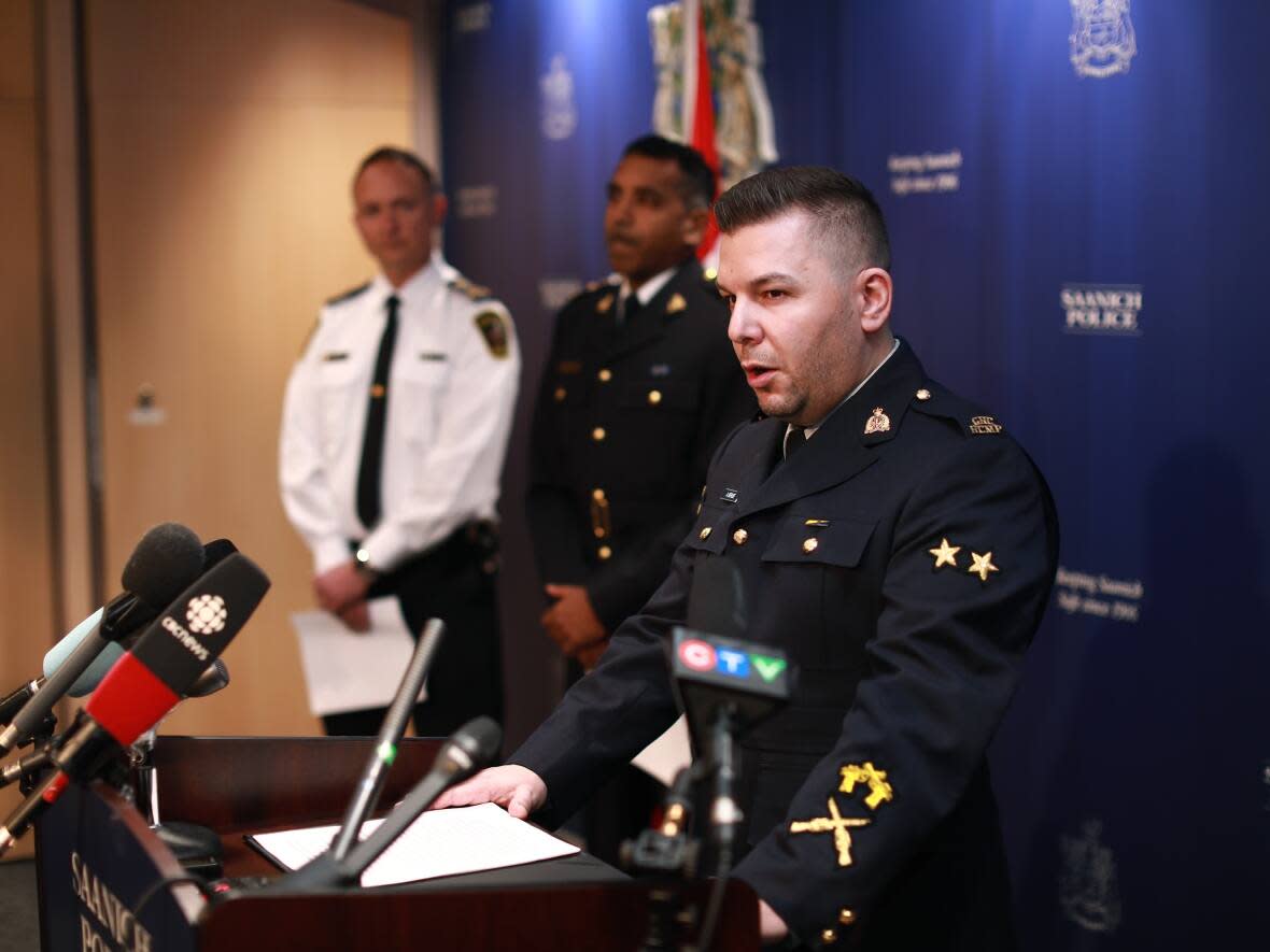 RCMP Cpl. Alex Bérubé provides an update of the investigation into the shooting on June 28, 2022 outside a Bank of Montreal, between brothers Mathew and Isaac Auchterlonie and police. (Chad Hipolito/The Canadian Press - image credit)