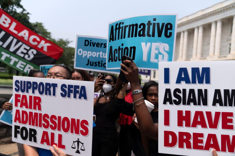 Demonstrators protest outside of the Supreme Court on June 29, 2023.