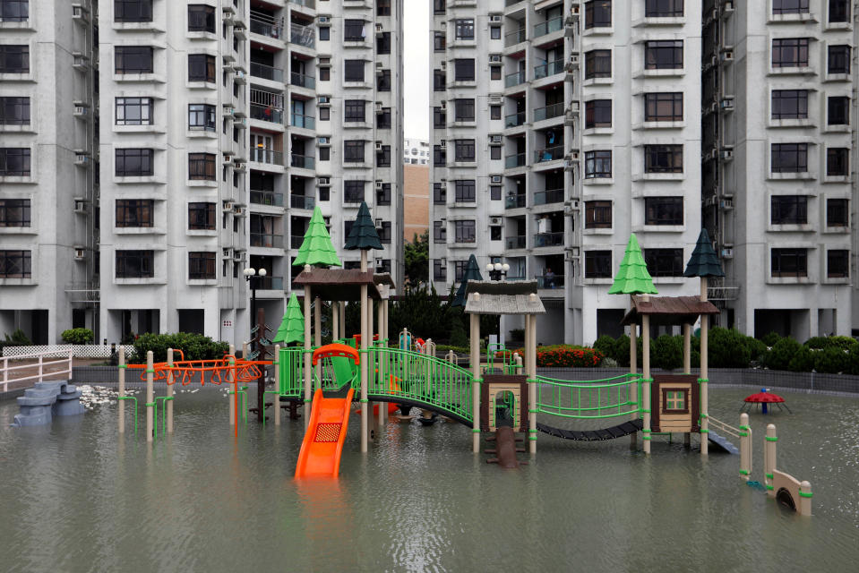 <p>A flooded playground is seen after Typhoon Hato hits Hong Kong, China, Aug. 23, 2017. (Photo: Tyrone Siu/Reuters) </p>