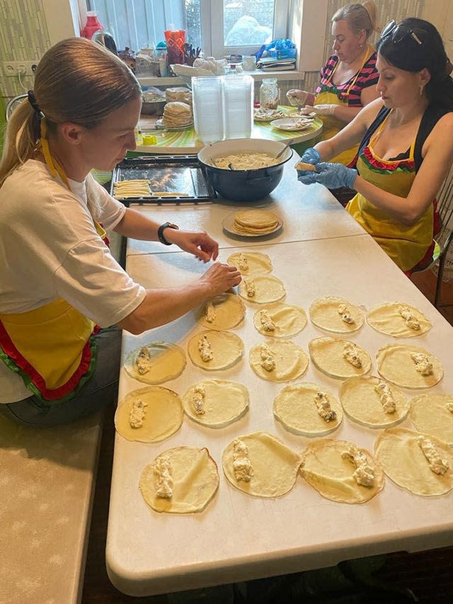 Women preparing food for the front line