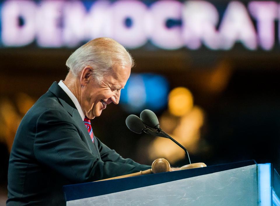 On July 27, 2016, former Vice President Joe Biden laughs after calling Donald Trump "clueless" as he speaks during the third day of the Democratic National Convention at the Wells Fargo Center in Philadelphia.