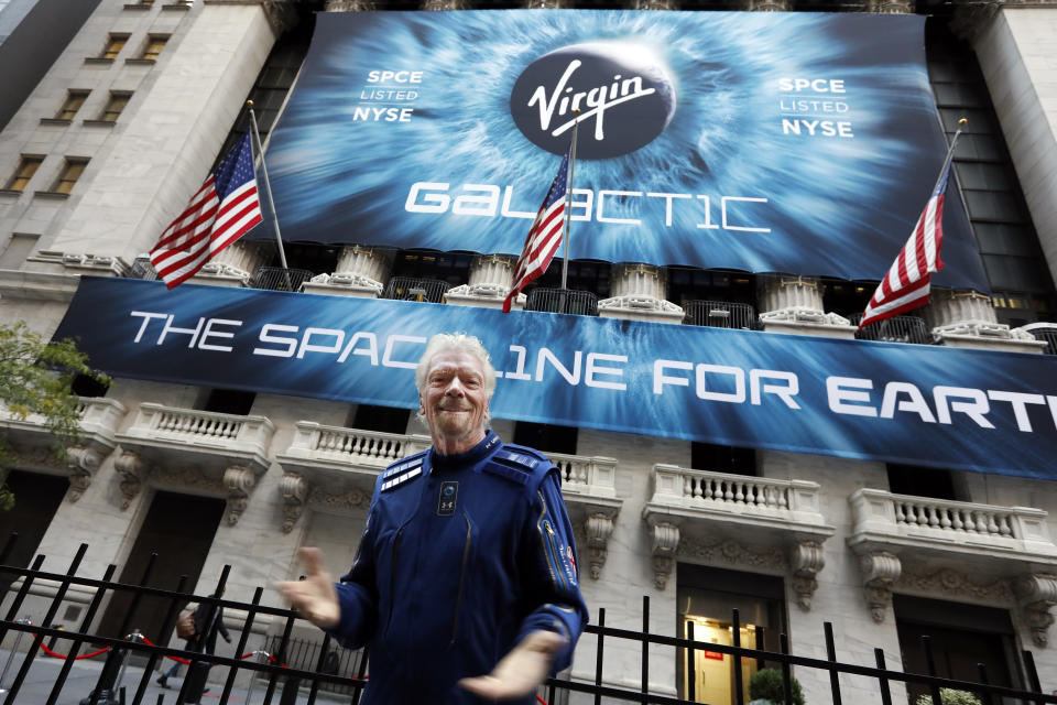 Sir Richard Branson, founder of Virgin Galactic, poses for a photo outside the New York Stock Exchange before his company's IPO, Monday, Oct. 28, 2019. (AP Photo/Richard Drew)