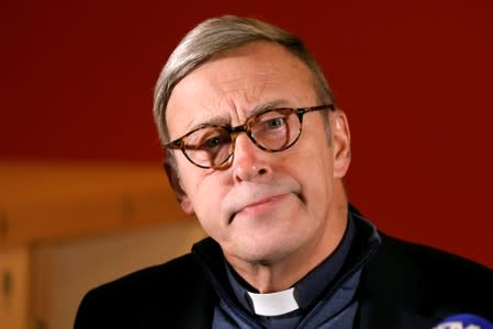 Notre-Dame de Paris cathedral rector Patrick Chauvet attends a news conference in Paris