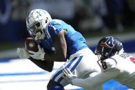 Indianapolis Colts' Parris Campbell (1) makes a touchdown catch against Houston Texans' Terrence Brooks (8) during the first half of an NFL football game, Sunday, Oct. 17, 2021, in Indianapolis. (AP Photo/AJ Mast)