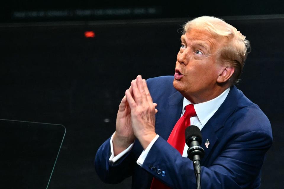 Trump speaks during a campaign rally at Johnny Mercer Theatre Civic Center in Savannah, Georgia, on September 24. He has claimed God spared his life in the two recent assassination attempts (AFP via Getty Images)