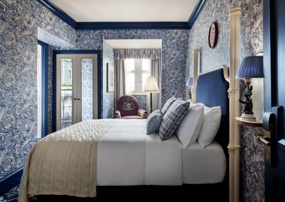 One of the heavily patterned guest rooms (Graduate Hotels)