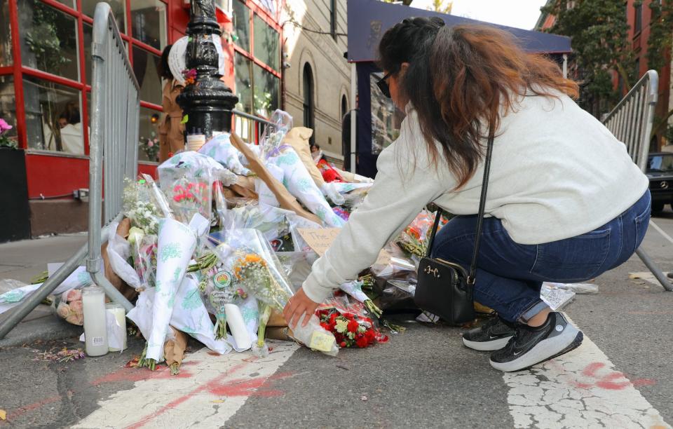 Tributes and flowers for Matthew Perry at the 'Friends' apartment building in the West Village, Manhattan on November 01, 2023 in New York City.