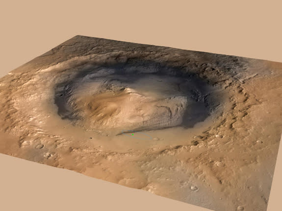 NASA's Curiosity rover landed in the Martian crater known as Gale Crater, which is approximately the size of Connecticut and Rhode Island combined. A green dot shows where the rover landed, well within its targeted landing ellipse, outlined in