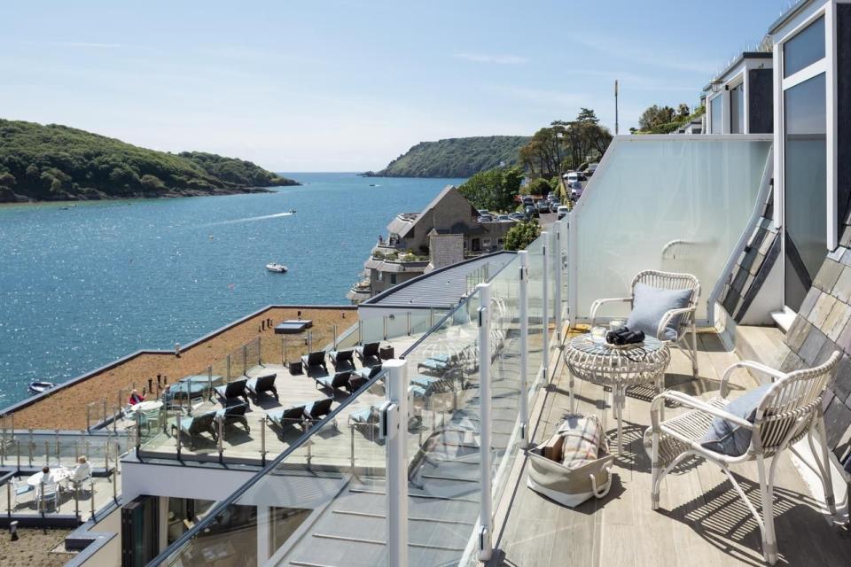 <p>Make the most of contemporary interiors with coastal beauty at the stylish <a href="https://www.booking.com/hotel/gb/salcombe-harbour.en-gb.html?aid=2070935&label=coastal-retreats" rel="nofollow noopener" target="_blank" data-ylk="slk:Salcombe Harbour Hotel & Spa;elm:context_link;itc:0;sec:content-canvas" class="link ">Salcombe Harbour Hotel & Spa</a>. This seaside sanctuary boasts nautical decor (think lobster pot lamps and modern stripes) and mesmerising sea views from almost every room. </p><p>Grab a lounger on the rooftop terrace and watch the boats go by with a cocktail, then head down for lunch at the waterside restaurant. You can enjoy scenic walks along the coastal path or rooftop yoga, as well as the spa with an indoor pool and hot tub. Bliss.</p><p><a href="https://www.countrylivingholidays.com/offers/devon-salcombe-harbour-hotel-spa" rel="nofollow noopener" target="_blank" data-ylk="slk:Read our review of Salcombe Harbour Hotel & Spa.;elm:context_link;itc:0;sec:content-canvas" class="link ">Read our review of Salcombe Harbour Hotel & Spa.</a></p><p><a class="link " href="https://www.booking.com/hotel/gb/salcombe-harbour.en-gb.html?aid=2070935&label=coastal-retreats" rel="nofollow noopener" target="_blank" data-ylk="slk:CHECK AVAILABILITY;elm:context_link;itc:0;sec:content-canvas">CHECK AVAILABILITY</a></p>