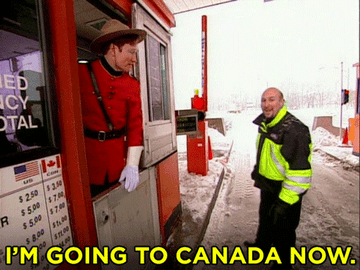 A Mountie interacts with a border officer at a booth covered in snow. Text on the image reads: "I'M GOING TO CANADA NOW."