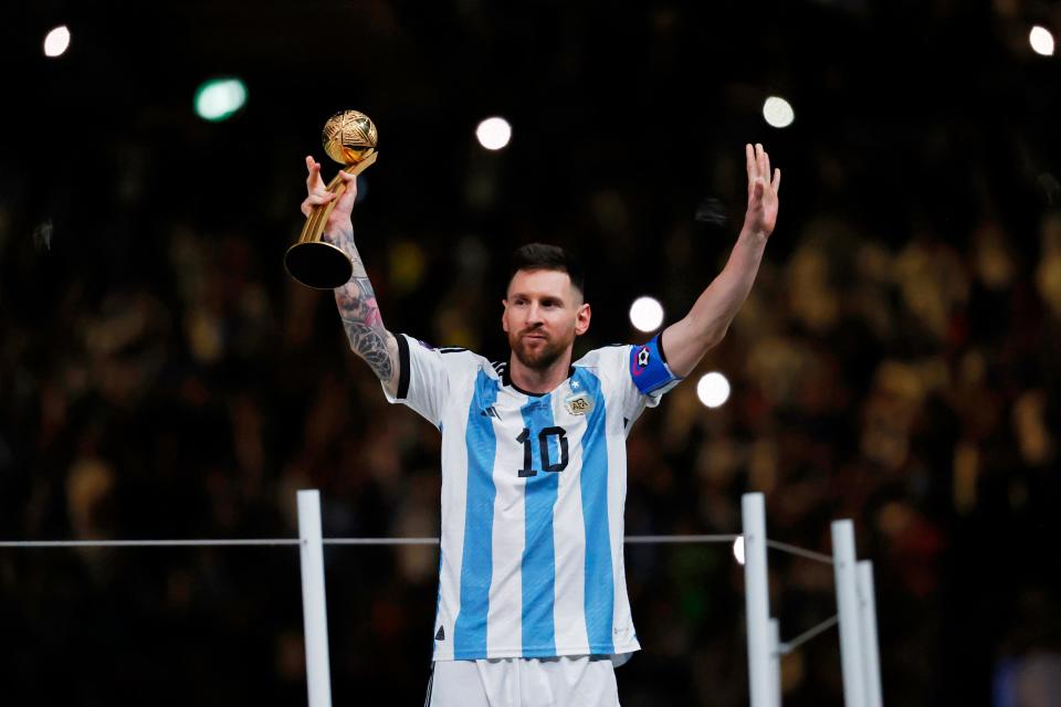 Lionel Messi celebrates after winning the 2022 World Cup in Qatar.