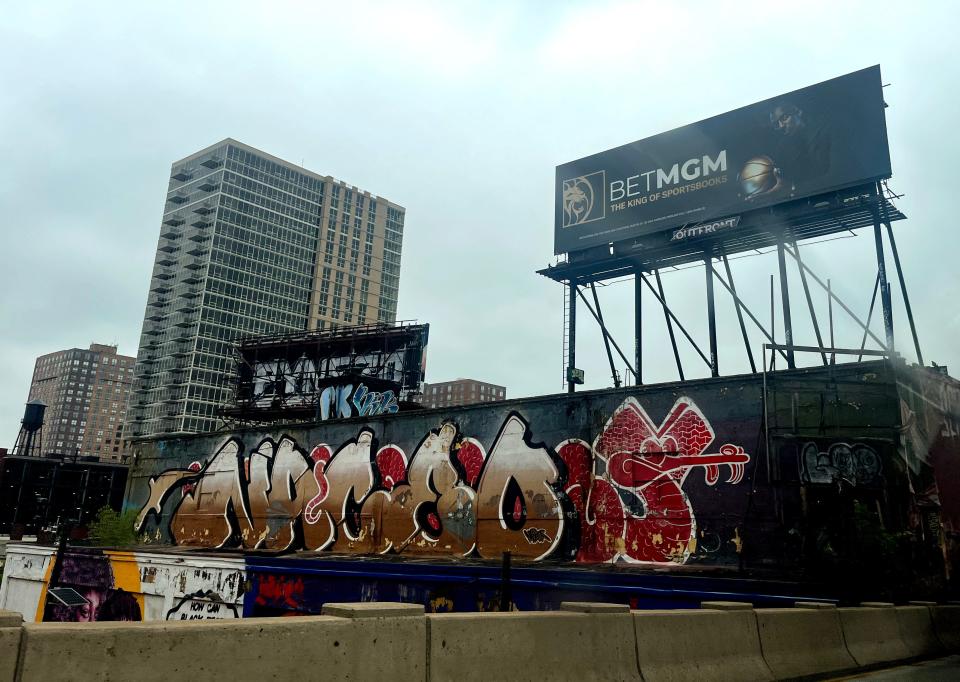 An online sportsbook billboard looks over NJ-139 East in Jersey City, New Jersey, on May 19, 2022.