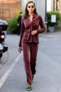 <p>Irina Shayk struts down the street during a photo shoot for H&M on Wednesday in Milan. </p>