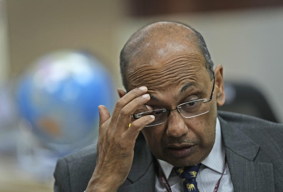 Ajay Mathur, director general of the International Solar Alliance, speaks to the Associated Press in his office in New Delhi, India, Wednesday, Oct. 27, 2021. India and the U.K. will launch a project that aims to create a solar grid connecting countries in different parts of the world at the upcoming U.N. climate talks in Glasgow, Scotland. The idea of a grid spanning regions is not new, but this is the first attempt to create a global network. Some experts view the project as India's counter to China's sweeping Belt and Road infrastructure initiative. (AP Photo/Manish Swarup)