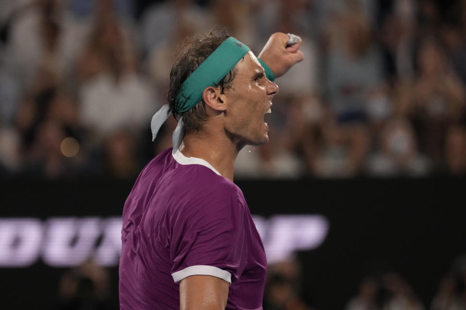 Rafael Nadal of Spain reacts during his men's singles final match against Daniil Medvedev of Russia at the Australian Open tennis championships in Melbourne, Australia, Sunday, Jan. 30, 2022. (AP Photo/Simon Baker)