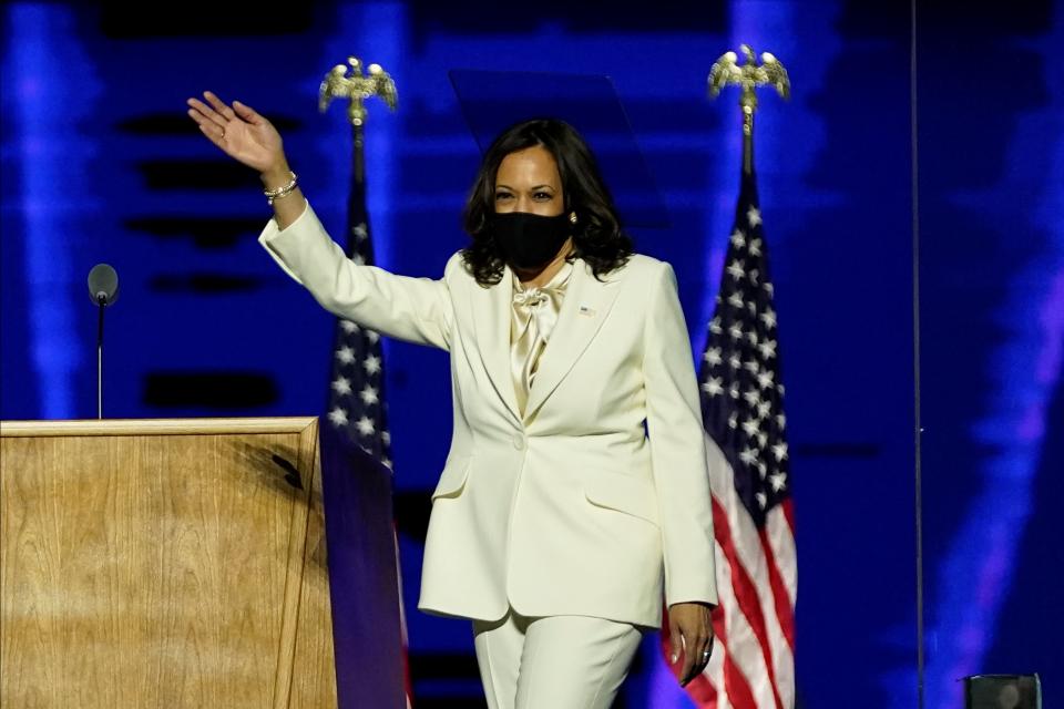 WILMINGTON, DELAWARE - NOVEMBER 07:  Vice President-elect Kamala Harris takes the stage at the Chase Center before President-elect Joe Biden's address to the nation November 07, 2020 in Wilmington, Delaware. After four days of counting the high volume of mail-in ballots in key battleground states due to the coronavirus pandemic, the race was called for Biden after a contentious election battle against incumbent Republican President Donald Trump. (Photo by Andrew Harnik-Pool/Getty Images)