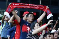 <p>Fans cheers for FC Bayern Muenchen team arrival outside the hotel </p>