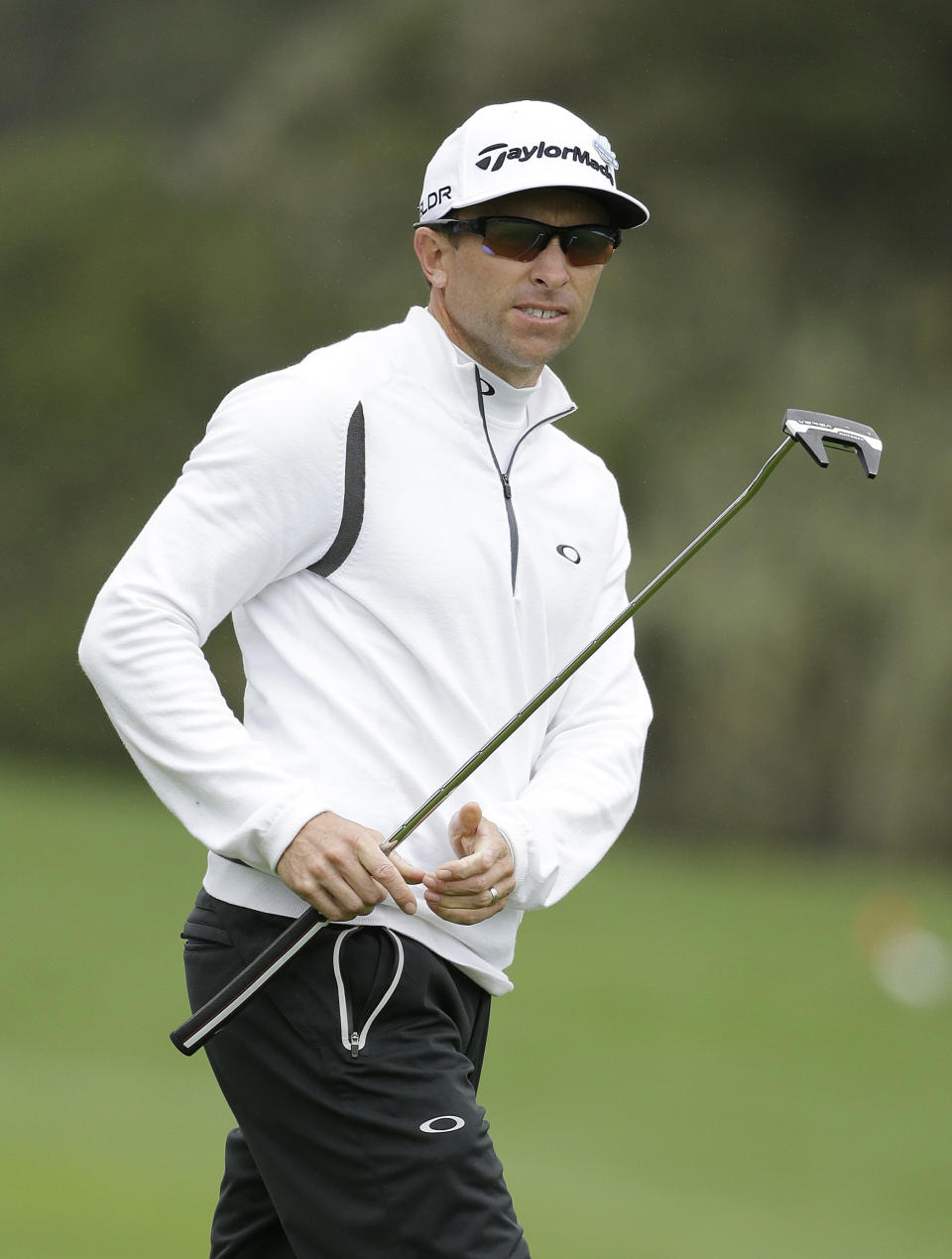 Tim Wilkinson of New Zealand, looks over the third green during the final round of the AT&T Pebble Beach Pro-Am golf tournament, Sunday, Feb. 9, 2014, in Pebble Beach, Calif. (AP Photo/Eric Risberg)