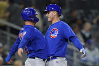 Chicago Cubs' Anthony Rizzo, right, celebrates with Joc Pederson after hitting a two-run home run during the seventh inning of the team's baseball game against the San Diego Padres, Tuesday, June 8, 2021, in San Diego. (AP Photo/Gregory Bull)