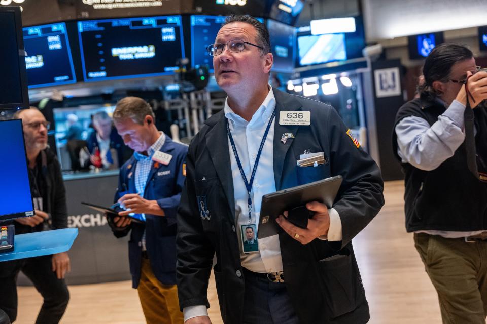 Traders work on the floor of the New York Stock Exchange (NYSE) on October 20, 2023 in New York City. The Dow is on a multi day losing streak as events in Israel add to global concerns about oil prices and inflation.