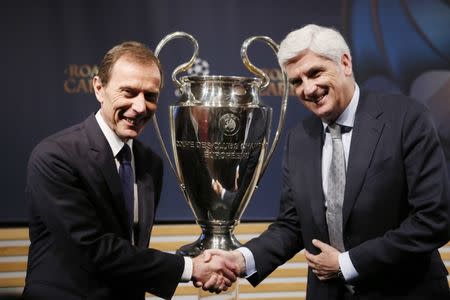 Football Soccer - UEFA Champions League Semi-Final Draw - Nyon, Switzerland - 21/4/17 Real Madrid Director of Institutional Relations Emilio Butragueno (L) and Atletico Madrid Managing Director Clemente Villaverde pose after the draw of the UEFA Champions League semi-finals Reuters / Pierre Albouy Livepic