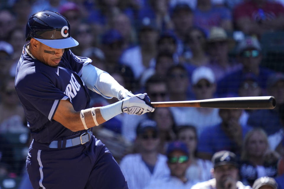 Chicago Cubs' Christopher Morel hits a sacrifice fly during the eighth inning of a baseball game against the Atlanta Braves in Chicago, Friday, June 17, 2022. (AP Photo/Nam Y. Huh)