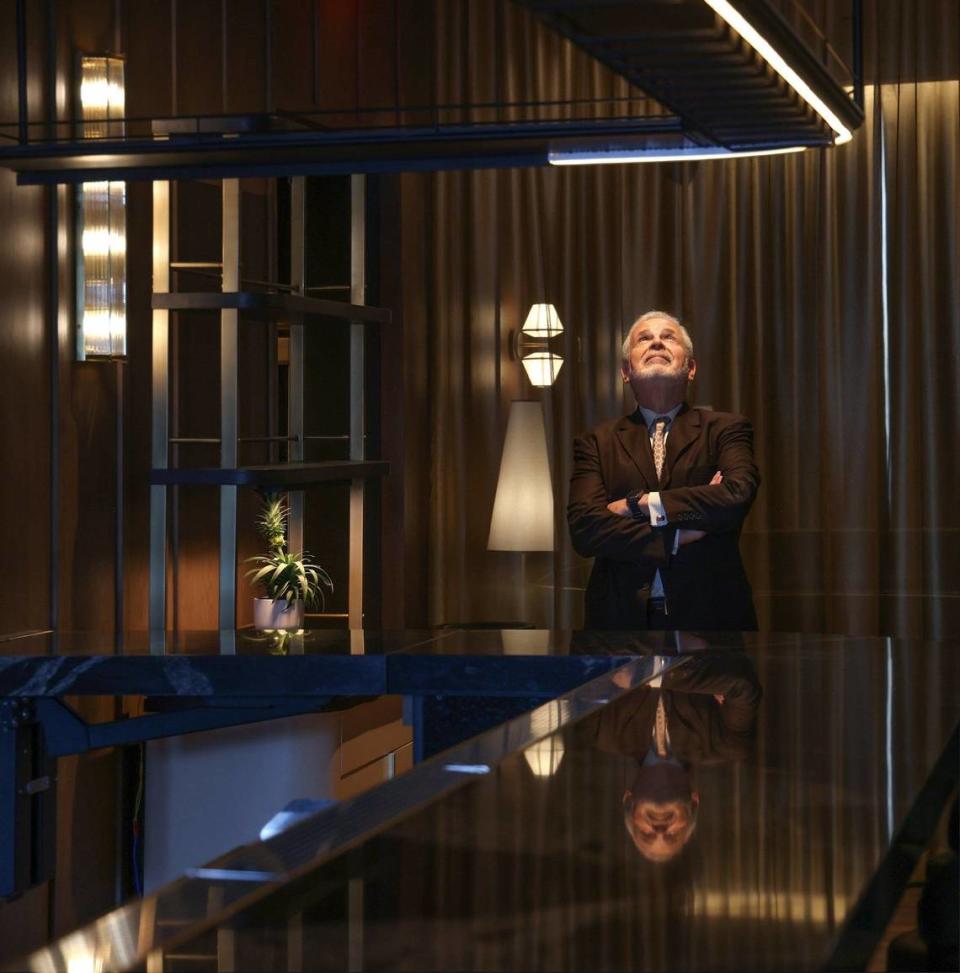 Russell Galbut checks the lighting inside the dim lit steakhouse at the soon-to-open Gale Miami Hotel & Residences during a recent property preview on Thursday, May 16, 2024 in Miami, Florida.